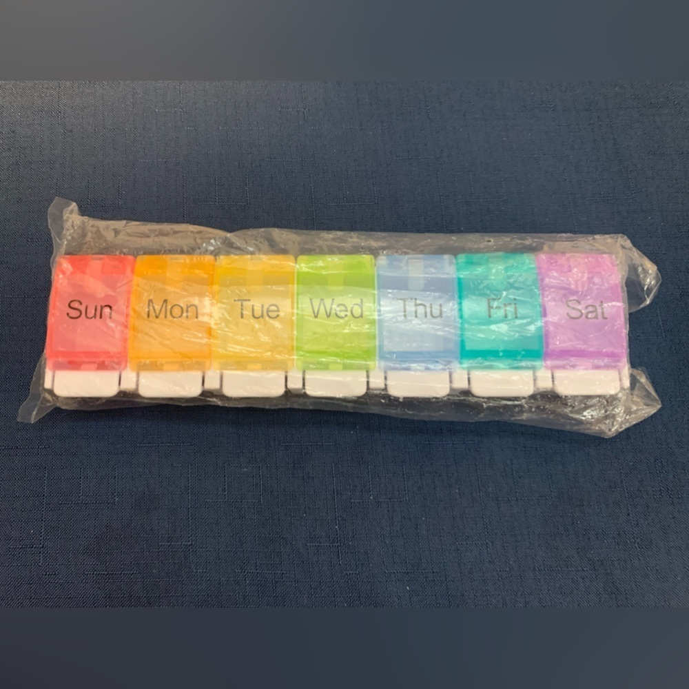 2/$10. NWT pill dispenser